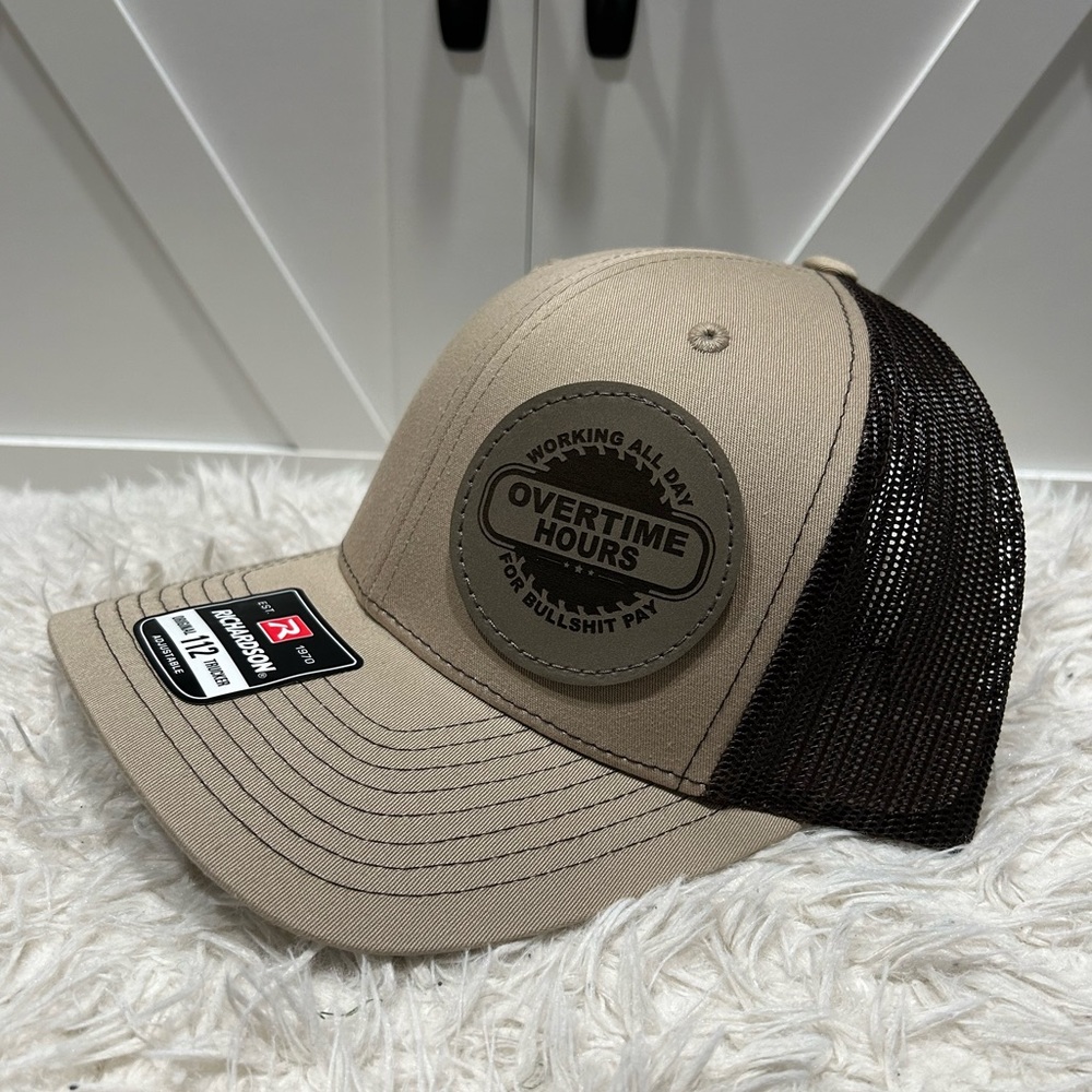 Overtime hours for bullsh*t pay. Richardson trucker hat.